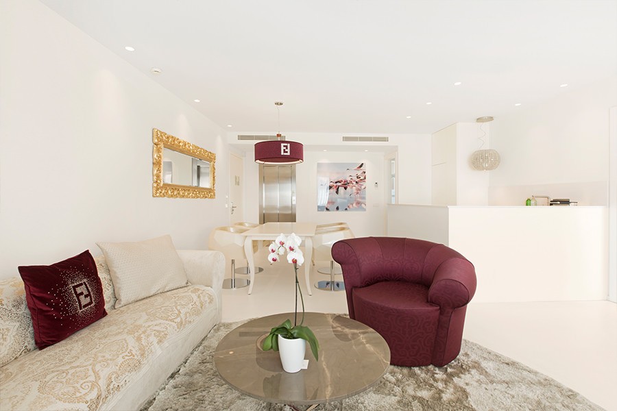 A fancy suite decorated in ruby and gold colors at Portals Hills Hotel