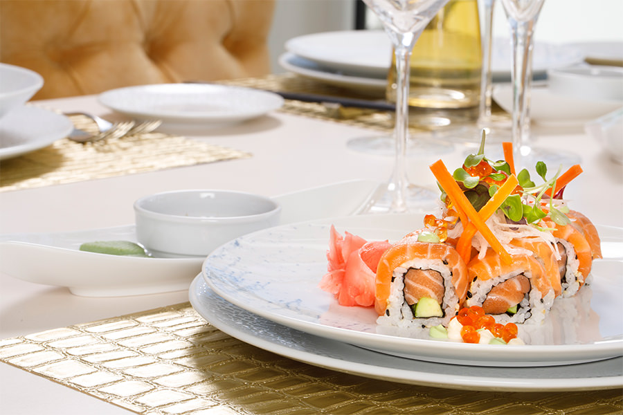 A close up of a sushi being served at the Collins Restaurant