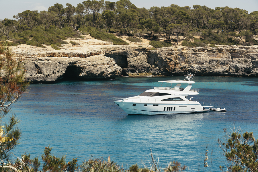A boat is moored in a bay off the coast of Majorca.